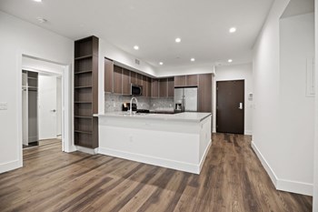 Kitchen and Dining Area with Recessed Lighting and Vinyl Flooring - Photo Gallery 44