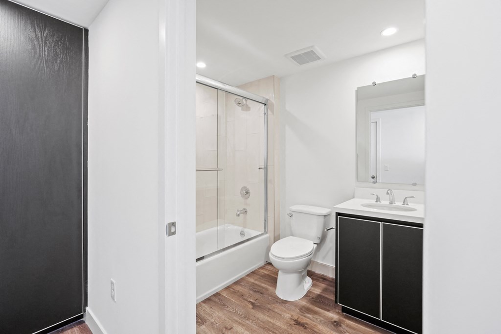 Bathroom with Shower Bath and Vanity Cabinet Storage
