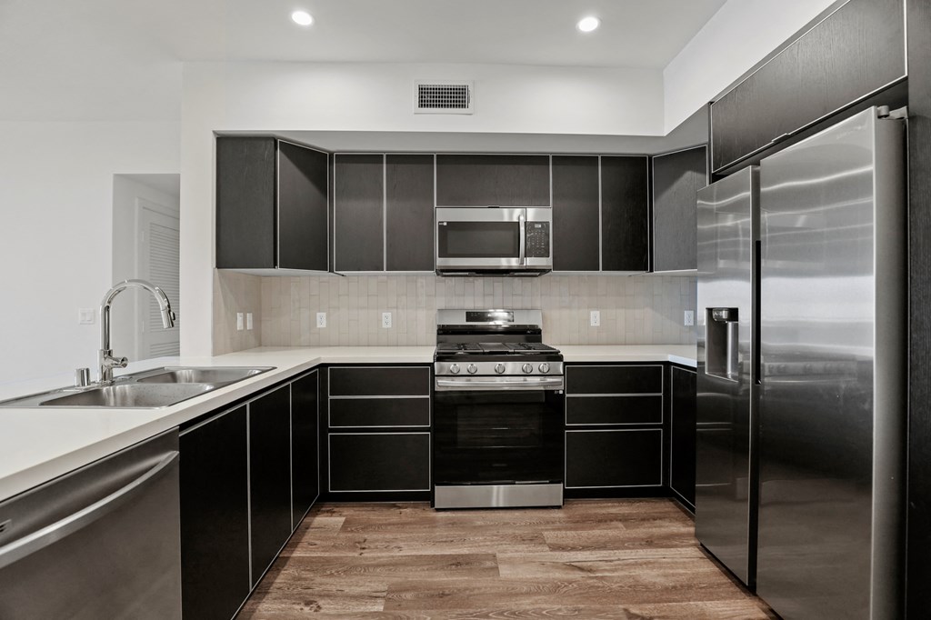 Kitchen with Energy-Efficient Appliances and Ample Cabinet Storage