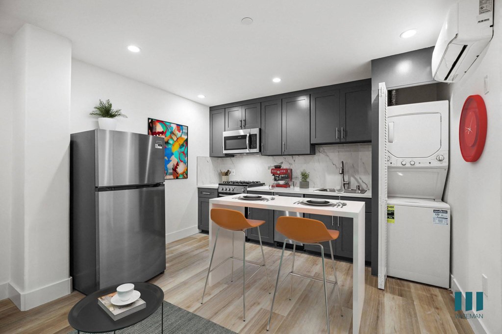 Open-Concept Kitchen with In-Suite Washer & Dryer