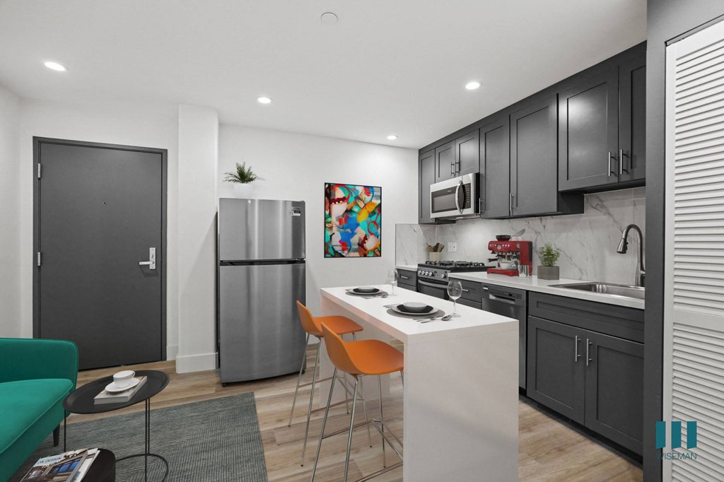 Kitchen with Stainless-Steel Refrigerator, Stove, and Dishwasher