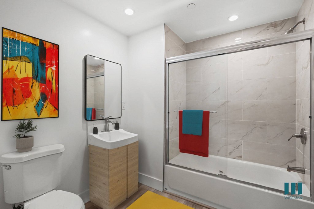 Bathroom with Shower Bath and Vanity Cabinet Storage