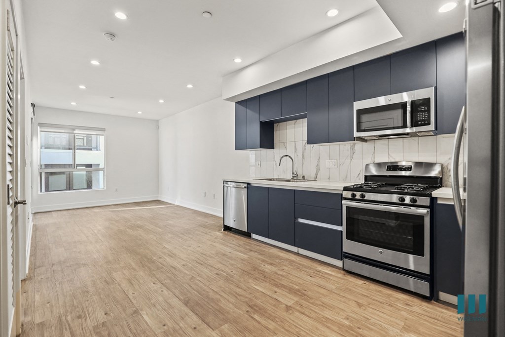 Open-Concept Kitchen, Dining, and Living Room Space