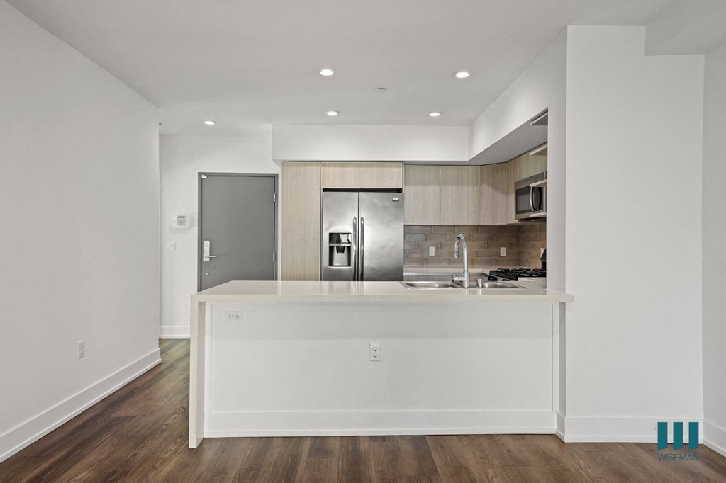 Front Entrance and Kitchen with Countertop Bar