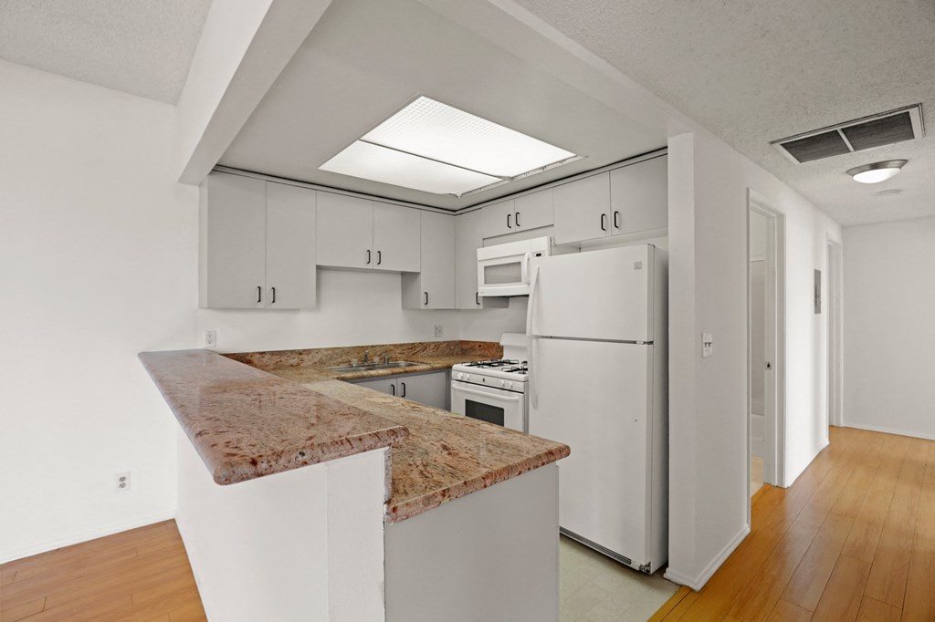 Kitchen with Refrigerator, Stove, Dishwasher, and Microwave