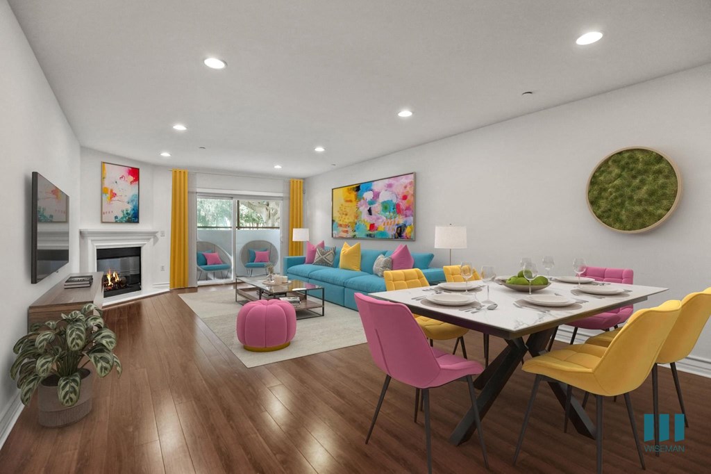 Open-Concept Dining, and Living Room, with Fireplace and Patio