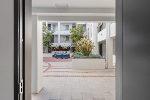 Lower LevelApartment Entrance off of Interior Courtyard