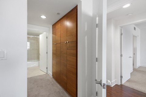 Bedroom with Bathroom and Built-In Cabinet Storage