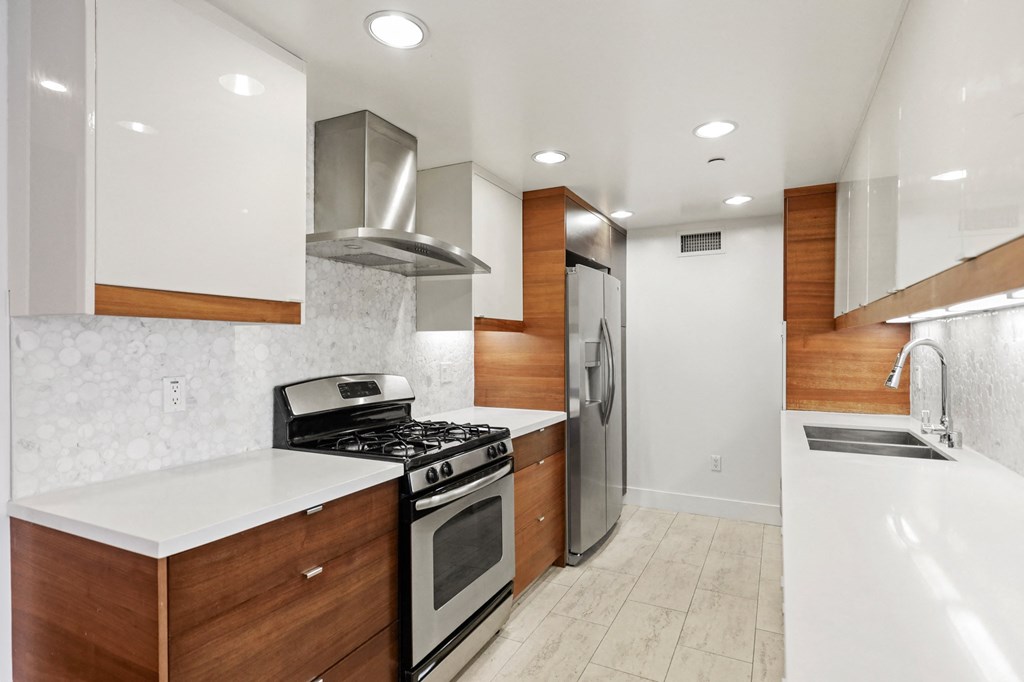 Full-Size Kitchen with Energy-Efficient Appliances, Ample Cabinet Storage, and Countertop Space