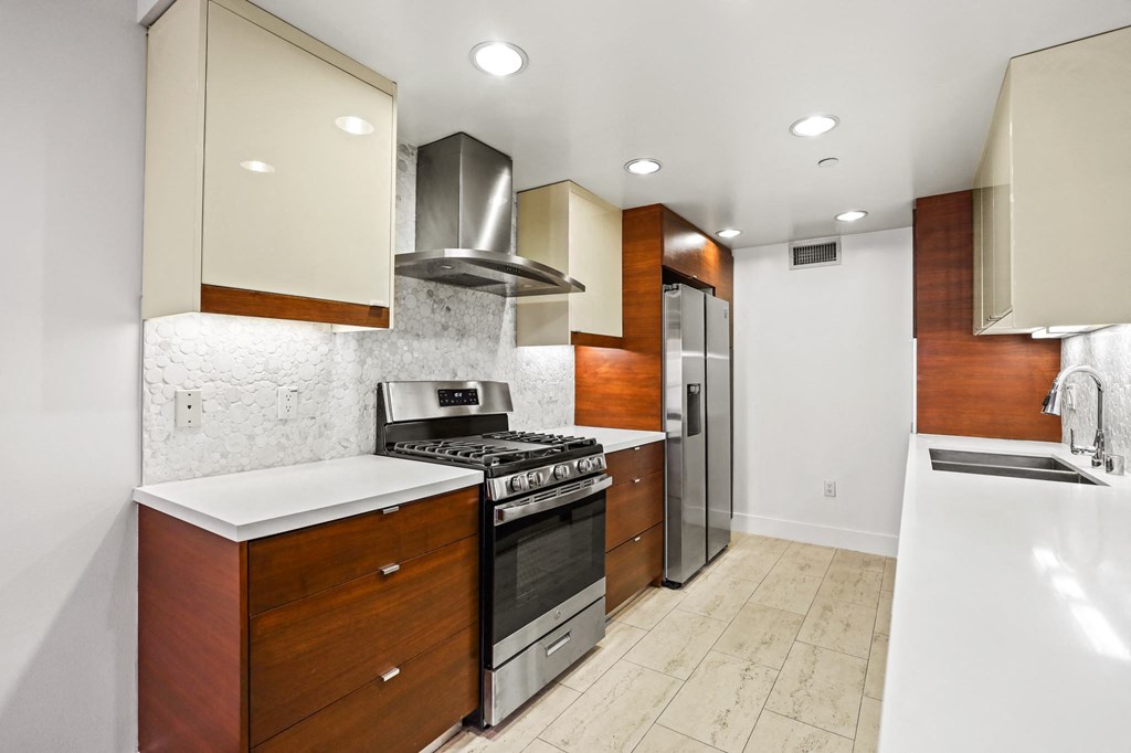 Kitchen with Stainless Steel Appliances and Ample Cabinet Storage