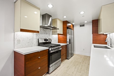 Kitchen with Stainless Steel Appliances and Ample Cabinet Storage