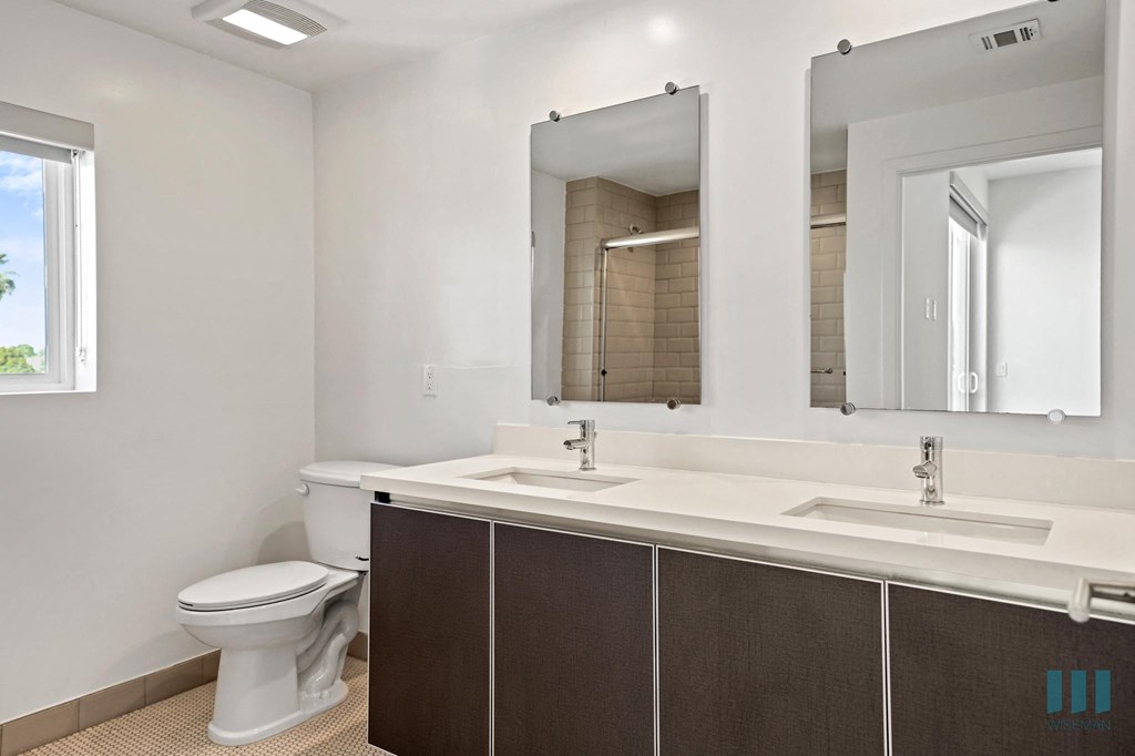 Bathroom with Double-Sink Vanity and Cabinet Storage