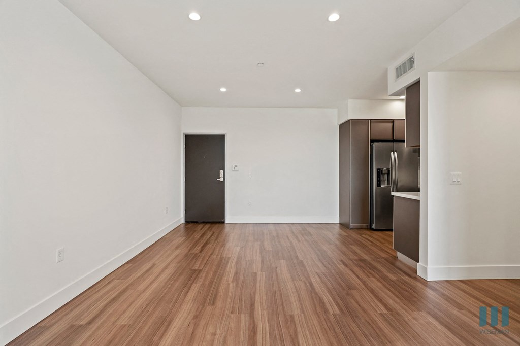 Front Entrance and Open-Concept Kitchen and Dining Space