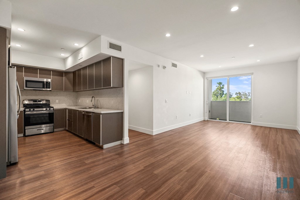 Open-Concept Kitchen, Dining, and Living Room Area