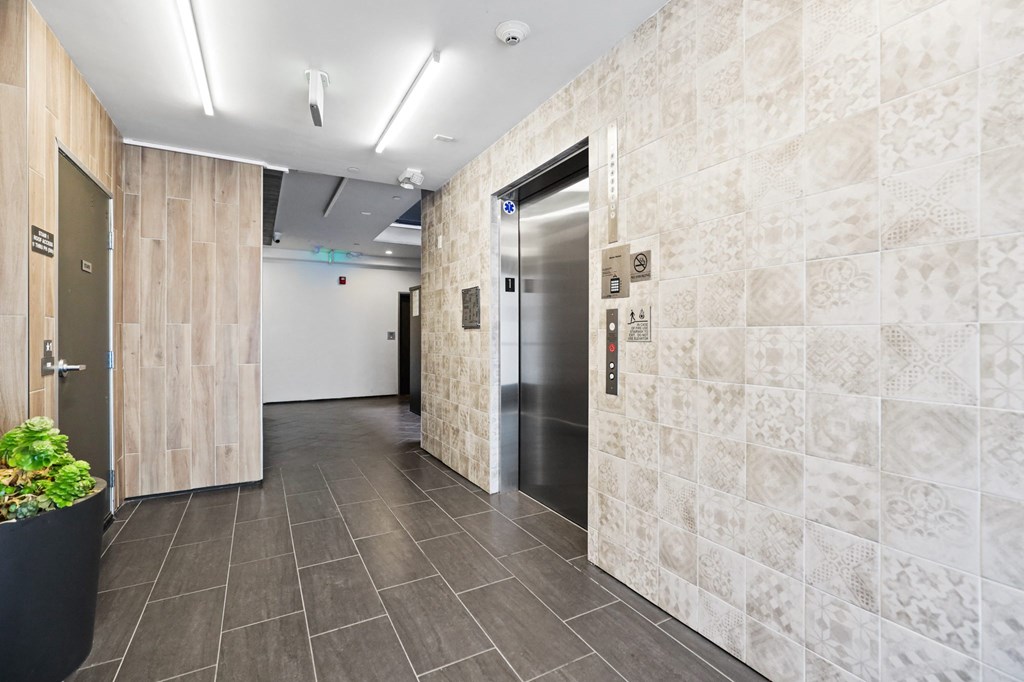 Elevator in Lobby Area of Dunn Station by Wiseman