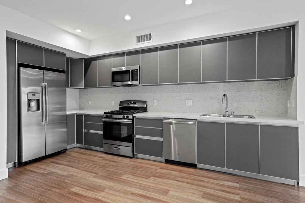 Kitchen with Stainless Steel Appliances and Ample Cabinet Storage