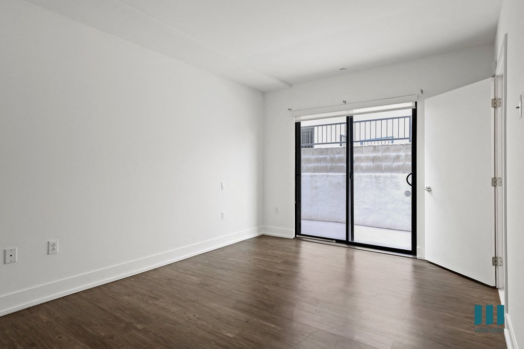 Bedroom with Sliding Glass Door for Balcony Access