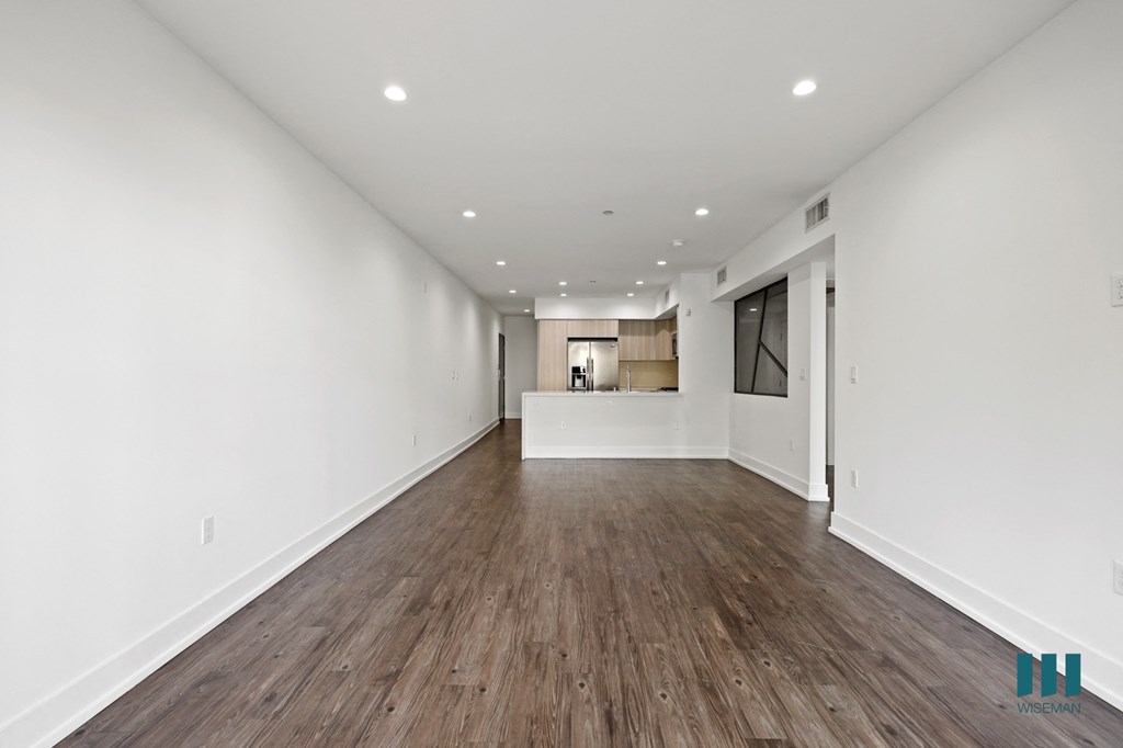 Open-Concept Kitchen, Dining, and Living Room Areas