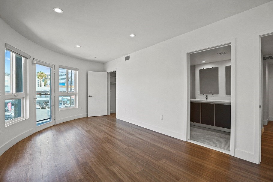 Bedroom with Bathroom, Closet, and Balcony