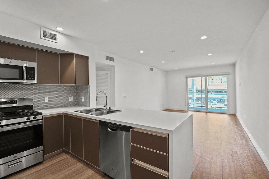 Open-Concept Kitchen, Dining, and Living Room Areas