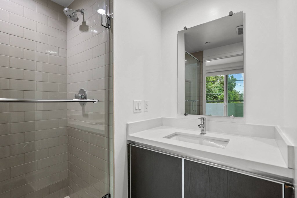 Bathroom with Stand-Up Shower and Vanity Cabinet Storage
