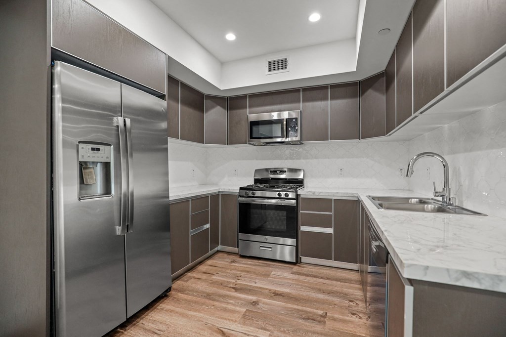 Kitchen with Energy-Efficient Appliances and Ample Cabinet Storage