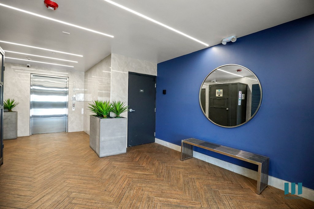 Lobby Area with Seating and Elevator