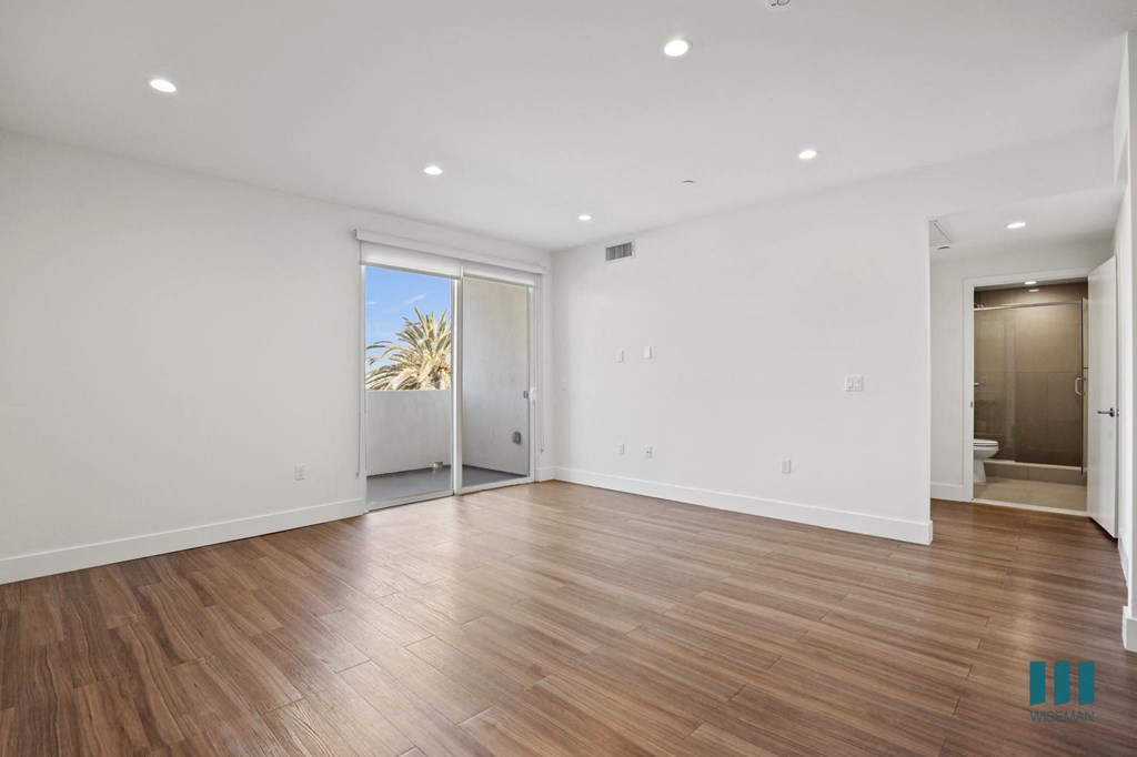 Living Room with  Vinyl Flooring, Recessed Lighting, and Patio