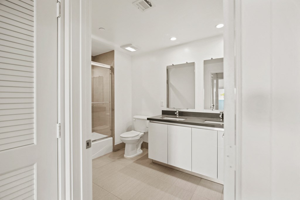 Bathroom with Double-Sink Vanity and Bathtub