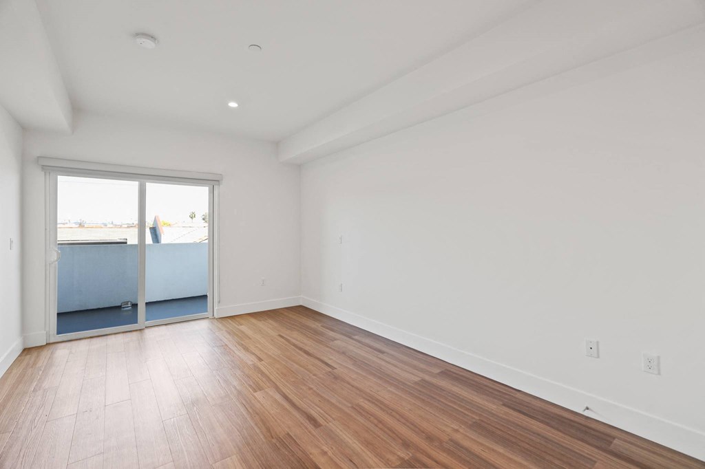 Living Room with Recessed Lighting, Vinyl Flooring, and Patio