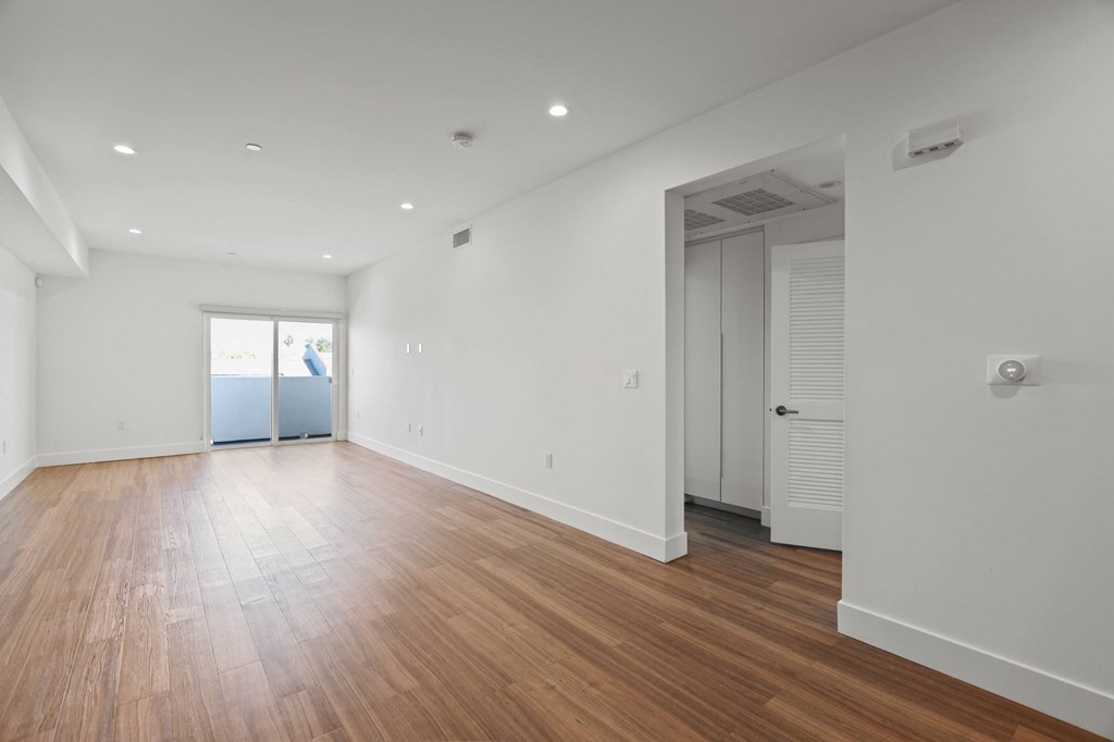 Dining and Living Room Space with Recessed Lighting, Vinyl Flooring, and Patio