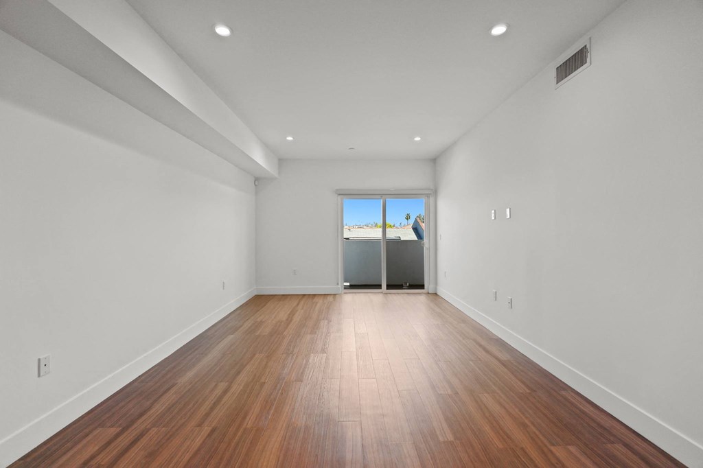 Open-Concept Dining and Living Room Space with Patio