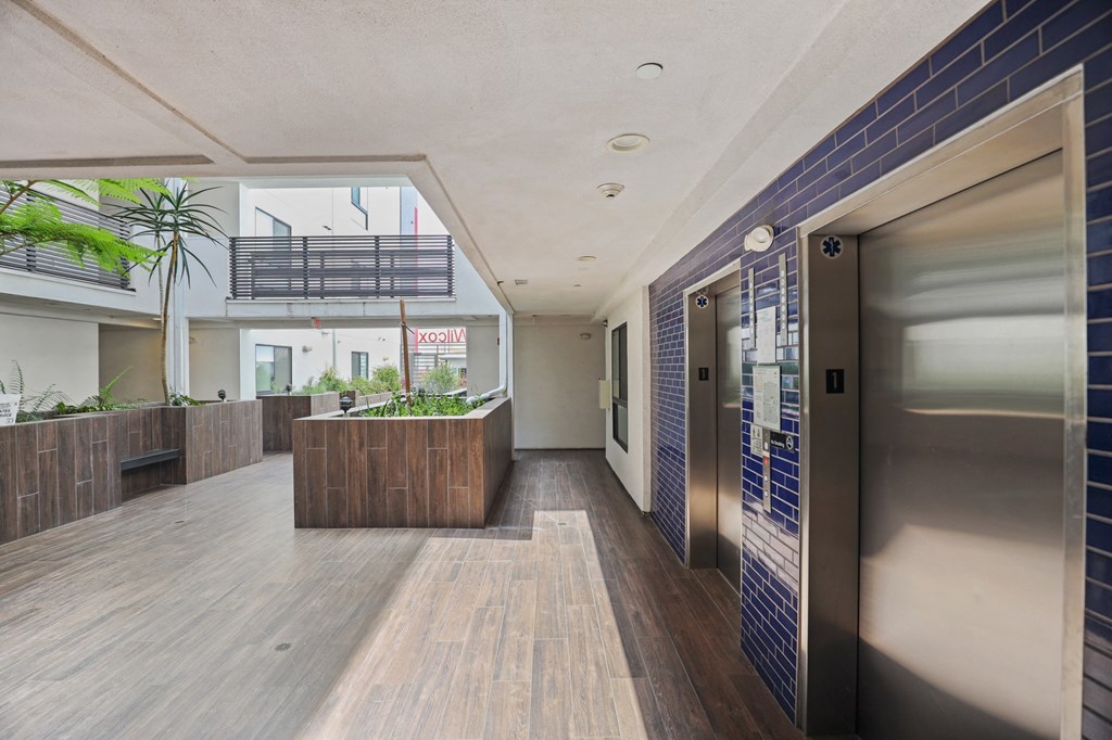 Resident Elevators In Courtyard Area