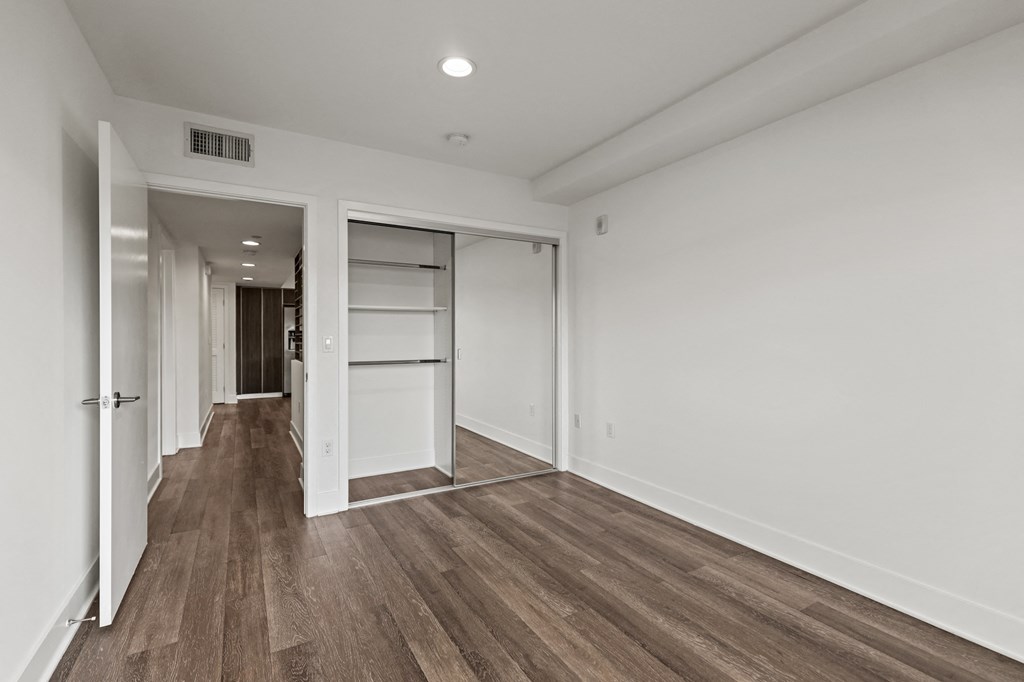 Bedroom with Mirrored Closet