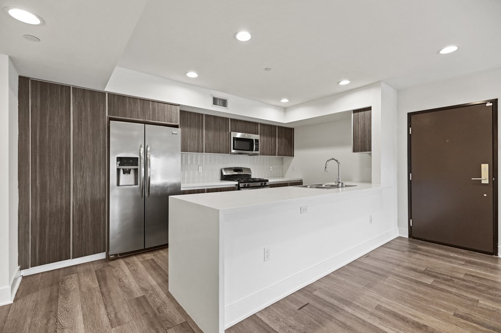 Kitchen with Stainless Steel Appliances and Ample Cabinet Storage