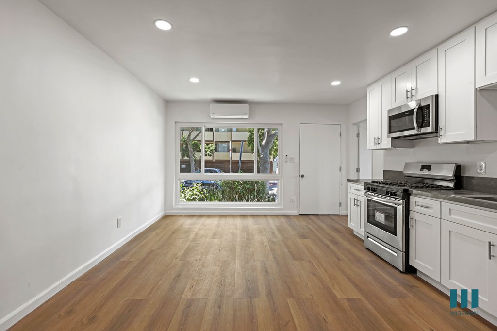 Open-Concept Kitchen, Dining, and Living Room Areas