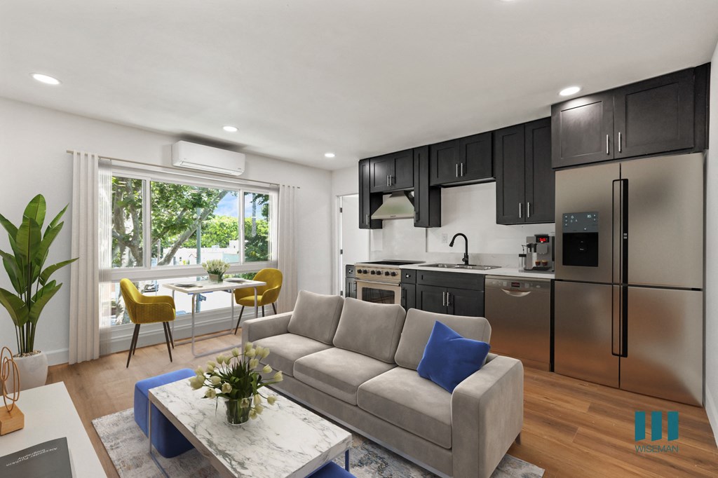 Open-concept Kitchen, Dining, and Living Rooms