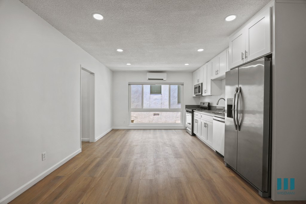 Open-Concept Kitchen, Dining, and Living Room Areas