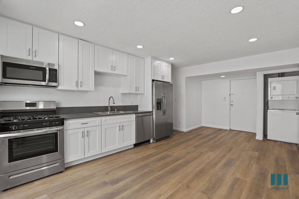 Open-Concept Kitchen, Dining, and Living Room Areas