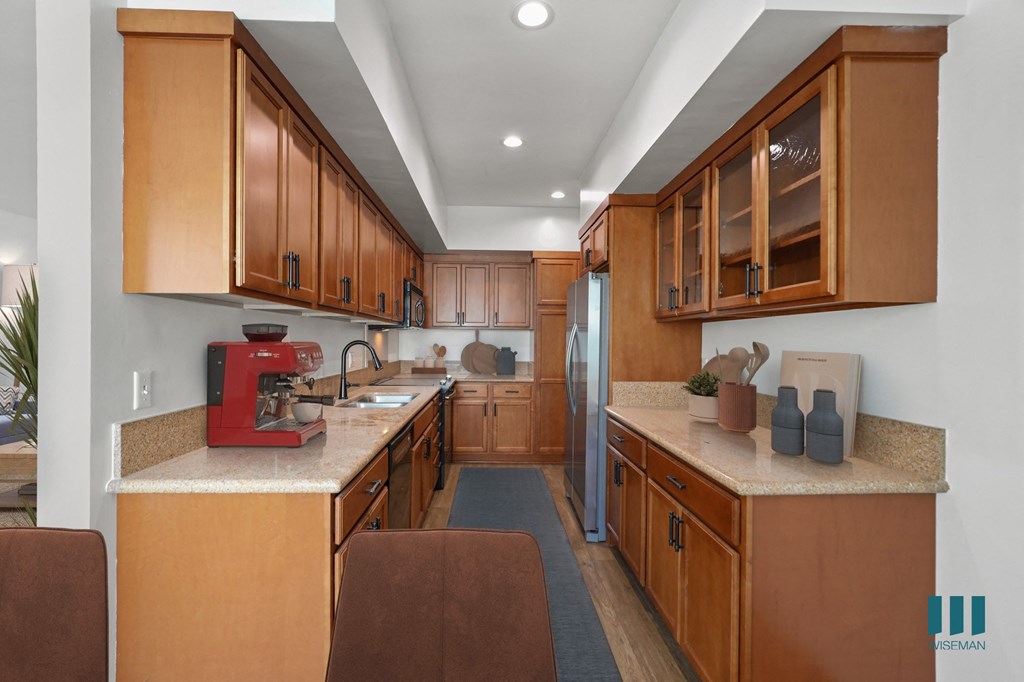 Kitchen with Energy-Efficient Appliances and Ample Cabinet Storage