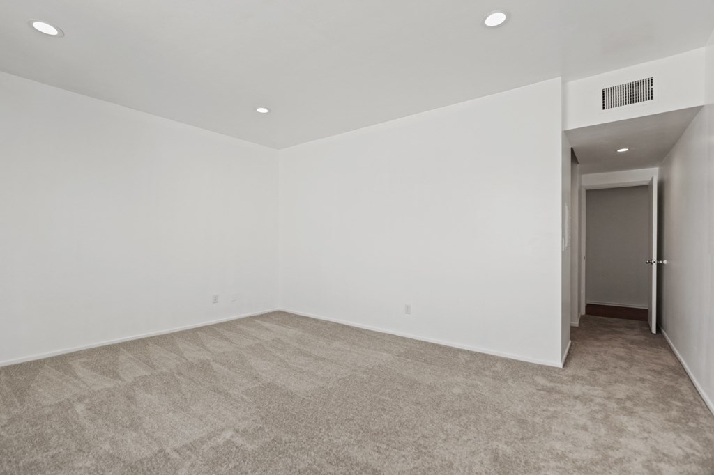 Bedroom with Recessed Lighting and Carpet
