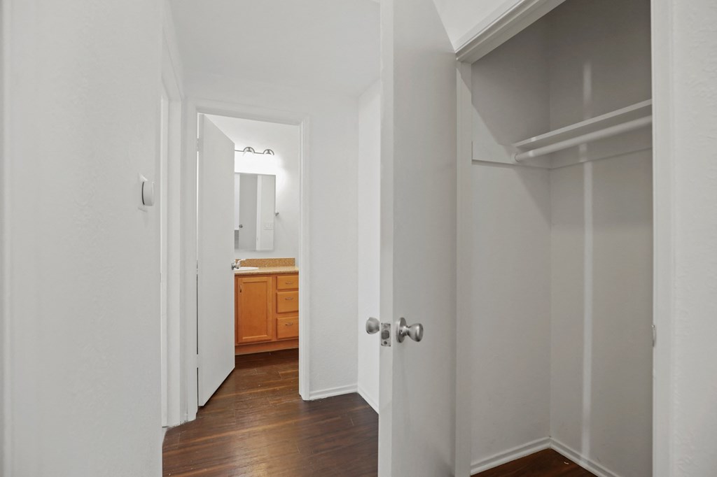 Hallway with Storage Closet and Bathroom
