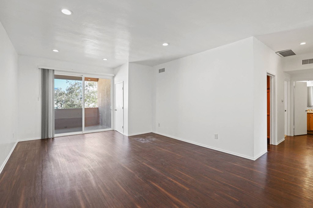 Living Room Area with Recessed Lighting, Vinyl Flooring, and Patio