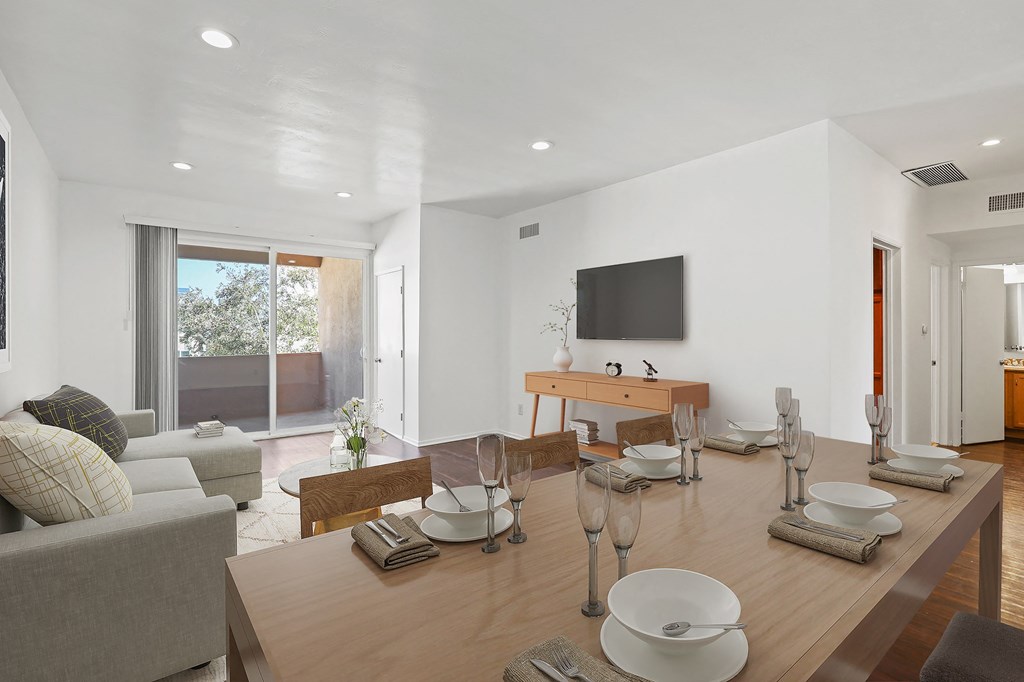 Dining and Living Room Space with Recessed Lighting, Vinyl Flooring, and Spacious Patio