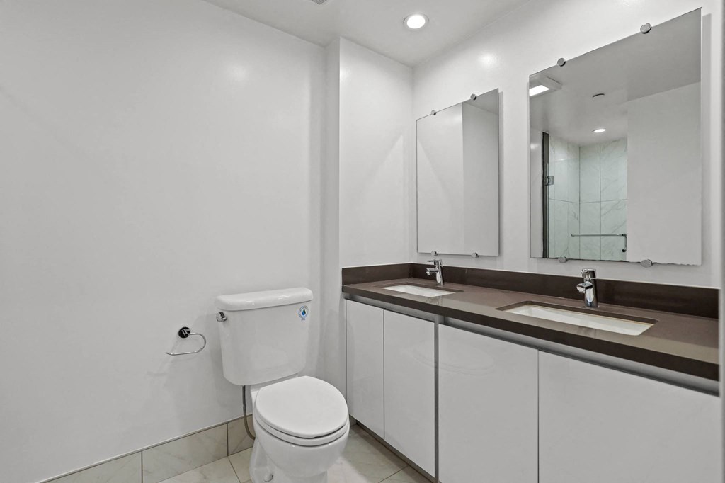 Bathroom with Double-Sink Vanity and Cabinet Storage