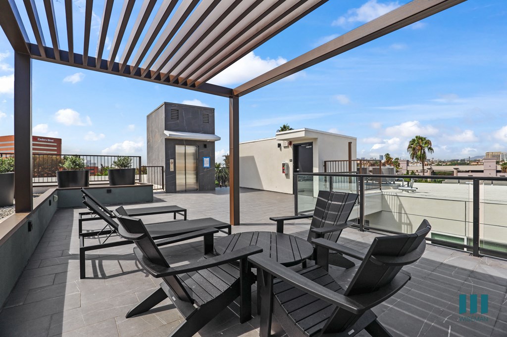 Rooftop Terrace with Pergola and Seating Area