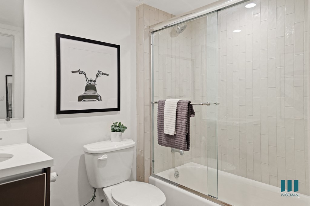 Bathroom with Full-Size Bathtub with Glass Door