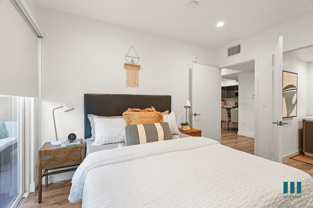Bedroom with Private Entrance, Bathroom, and Mirrored Closet