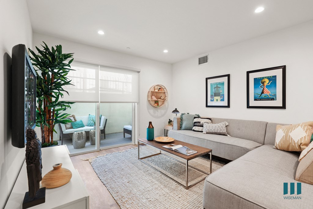 Living Room with Vinyl Flooring, Recessed Lighting, and Patio