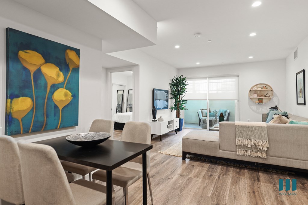 Open-Concept Living and Dining Areas with Patio